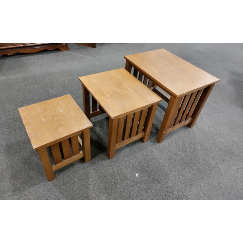 437 - A nest of three pine tables. Small H 33cm x W 31cm x D 29cm, Medium H 39cm x W 43cm x D 35cm, Large ... 