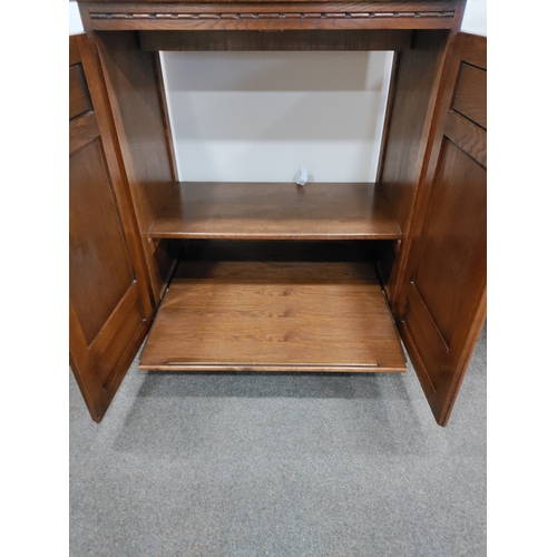 439 - Vintage Old Charm Furniture TV Cabinet with sliding shelf at the bottom.