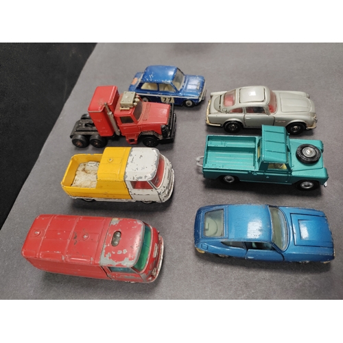 462 - Job lot of played with Corgi cars. The include land rover , commer , lancia and James bonds Aston Ma... 