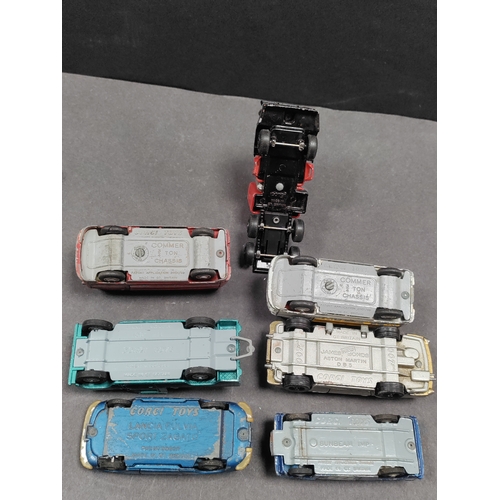 462 - Job lot of played with Corgi cars. The include land rover , commer , lancia and James bonds Aston Ma... 