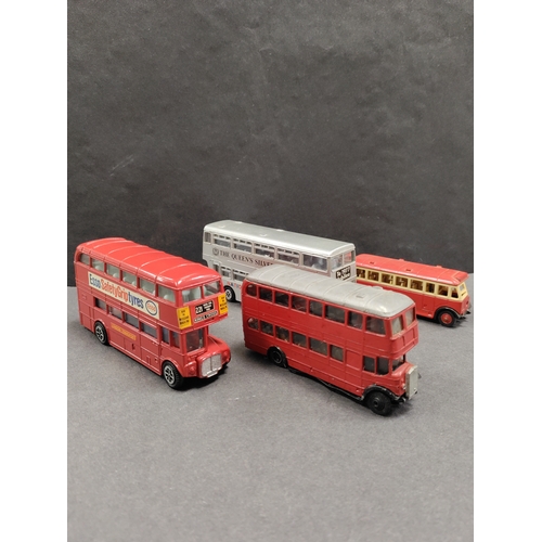 465 - Four Diecast buses. To include dinky, varney and days gone