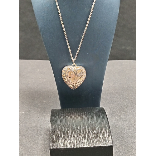 684 - Boxed 925 silver large heart pendant with scrolled diamanté detail on a 925 silver chain L 44cm