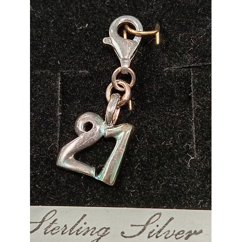 686 - 925 silver 21 charm boxed