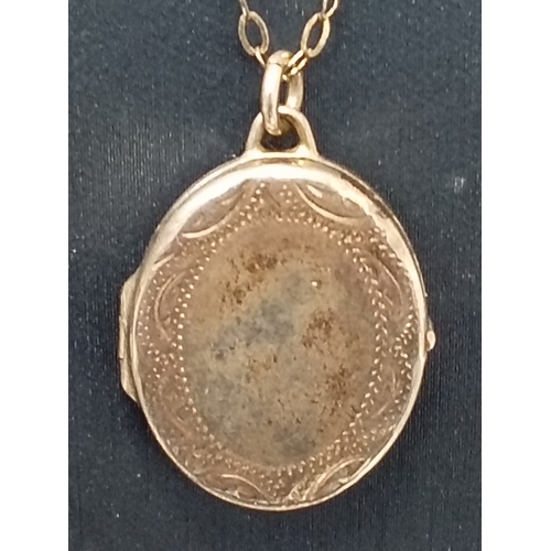 716 - Sterling silver Jam oval etched locket 2cm on 925 silver chain L 40cm