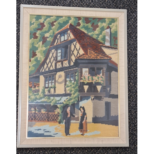 491 - Framed Cross Stitch Tapestry old style timbered house scene. H57cm x 44cm