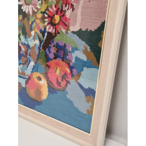 492 - Framed Cross Stitch Tapestry still life vase of flowers & fruits. H66cm x 53cm