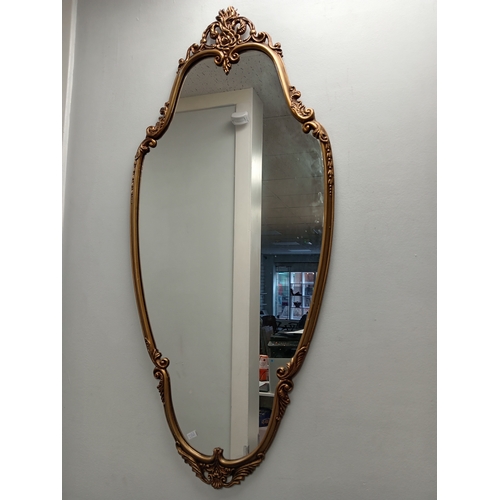 539 - Ornate gold metal framed hallway /bedroom mirror H 109cm x W 49cm slight chip in mirror