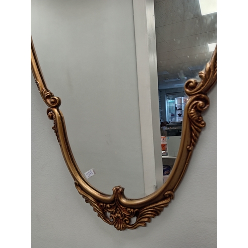 539 - Ornate gold metal framed hallway /bedroom mirror H 109cm x W 49cm slight chip in mirror