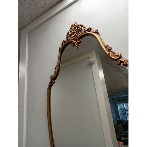 539 - Ornate gold metal framed hallway /bedroom mirror H 109cm x W 49cm slight chip in mirror