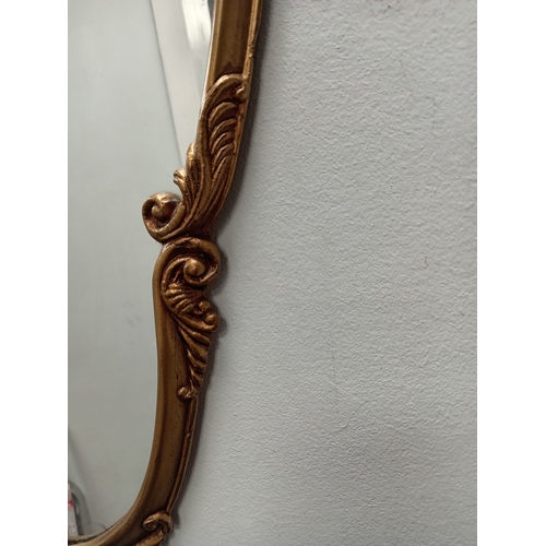 539 - Ornate gold metal framed hallway /bedroom mirror H 109cm x W 49cm slight chip in mirror