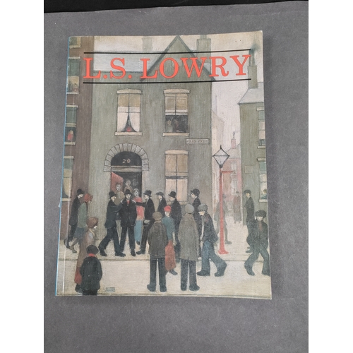 546 - A book about L.S. Lowry with lots of photos of his art.