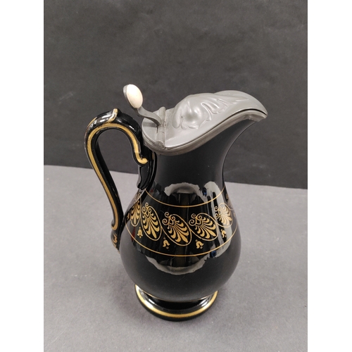 550 - Antique Victorian hand painted pitchers with pewter lids and ceramic thumb button.