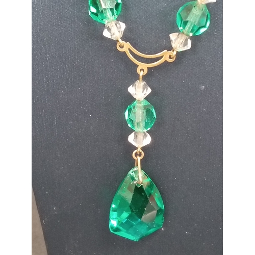 755 - 9ct gold green and clear glass beaded necklace L 40cm weight 7.22 grams