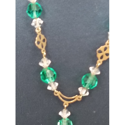 755 - 9ct gold green and clear glass beaded necklace L 40cm weight 7.22 grams