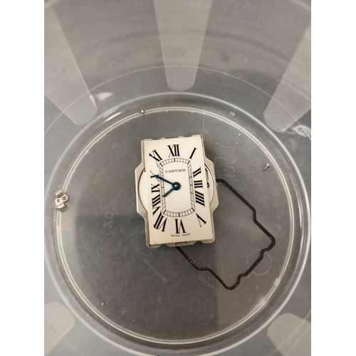 756 - Cartier Tank Americaine Swiss made watch movement with screws to secure it for a small ladies watch ... 