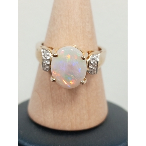 767 - Australian Coober Pedy opaque white opal 9ct gold ring size N weight 3.84 grams