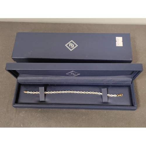 768 - 9ct White and Yellow gold bracelet cubic zirconia necklace in original box. Length 19cm. Weight 4.45... 