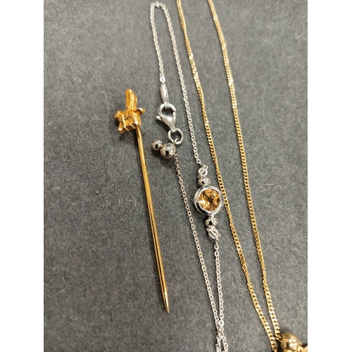 704 - Yellow metal man walking dog tie pin, yellow metal bracelet 20cm and 925 citrine stone bracelet 18cm