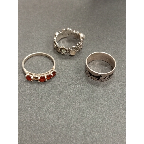 707 - Three 925 silver rings includes Pandora ring missing one stone size L, Garnet ring missing one stone... 