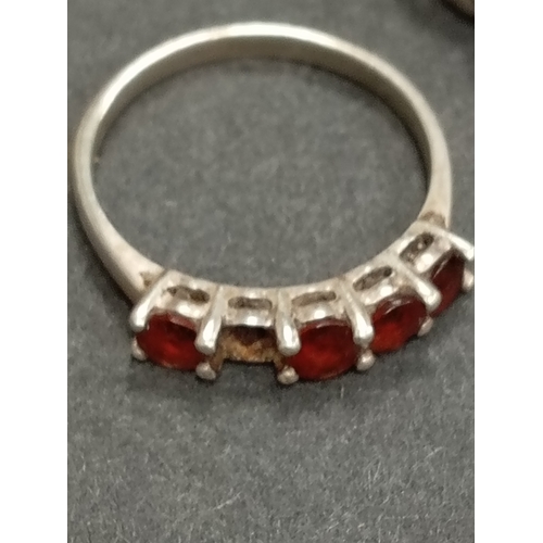 707 - Three 925 silver rings includes Pandora ring missing one stone size L, Garnet ring missing one stone... 