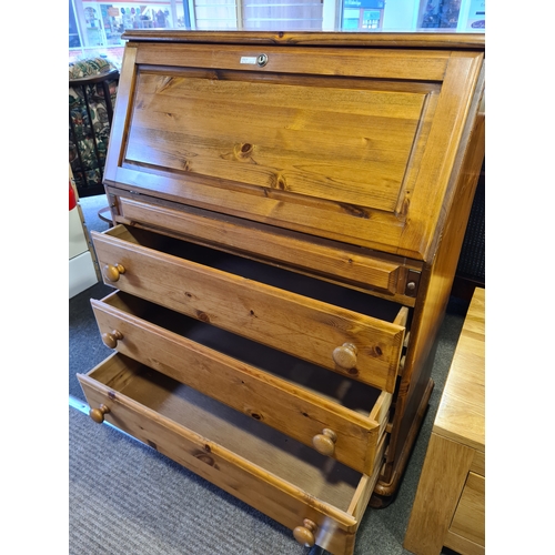 402 - Antique Pine Writing Bureau with 3 draws and lockable cupboard with key. H108cm x W87cm x D45cm