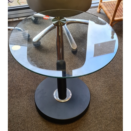 408 - Modern chromed round tall glass topped coffee table. H58cm x 60cm diameter.