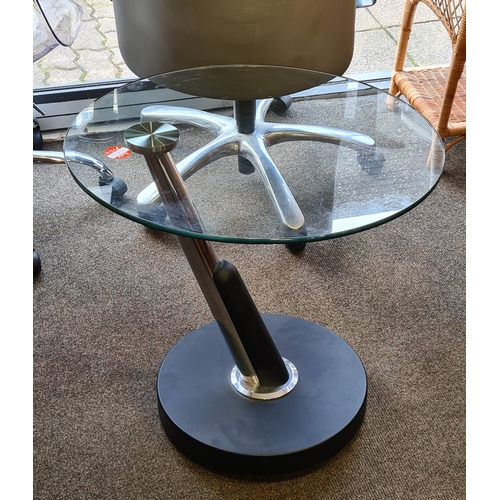 408 - Modern chromed round tall glass topped coffee table. H58cm x 60cm diameter.