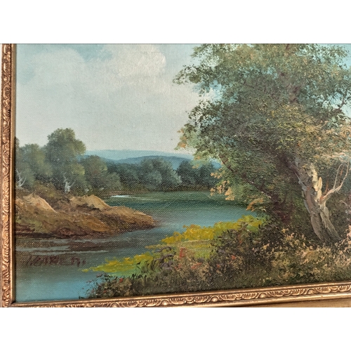 409 - Oil on canvas River scene in an ornate frame H 26cm x W 31cm