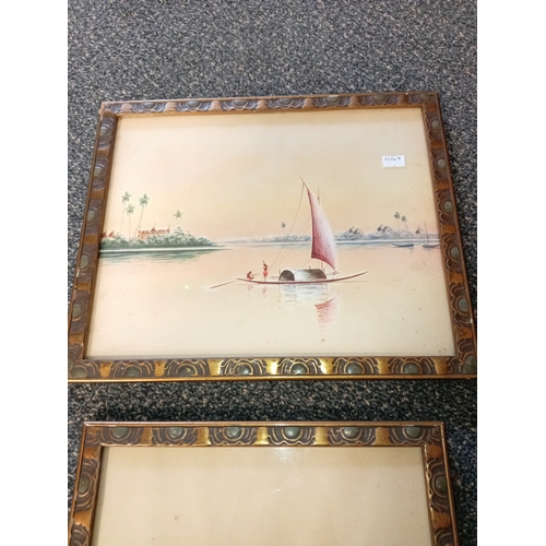 410 - Pair of unsigned African boat scene watercolour pictures in gilded frames H 35cm x W 29cm and H 29cm... 