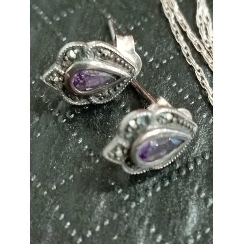 615 - 925 silver Amethyst coloured stone and marcasite pendant on chain L 52cm with matching earrings boxe... 