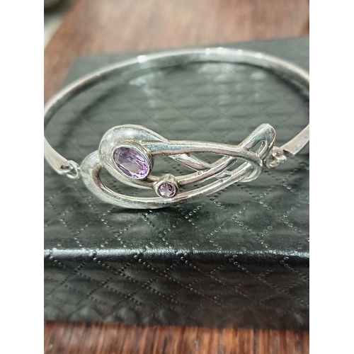 616 - 925 silver celtic and Amethyst coloured stone bangle 7cm diameter