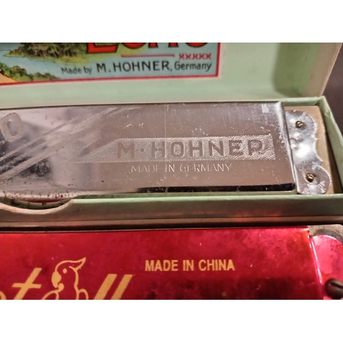 448 - Two vintage harmonicas, one in original box Echo made by M. Hohner Germany and one Parrot harmonica