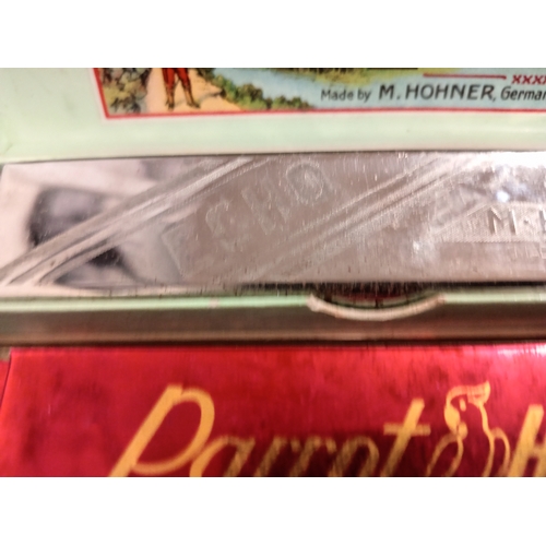 448 - Two vintage harmonicas, one in original box Echo made by M. Hohner Germany and one Parrot harmonica