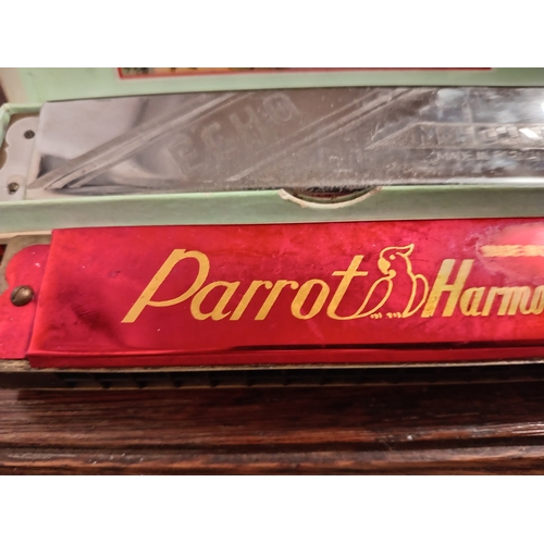 448 - Two vintage harmonicas, one in original box Echo made by M. Hohner Germany and one Parrot harmonica