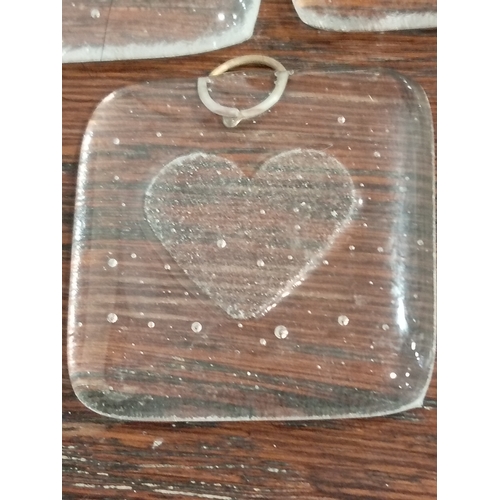 638 - Three square glass hand made heart pendants each measure 4cm x 4cm