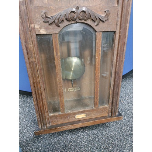 435 - Antique Westminster Glockenspiel 197 wall clock with beveled door glass. Complete with pendulum and ... 