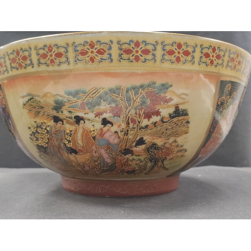 450 - Large ceramic chinese bowl depicting traditional scenes. H 14cm x W 30cm