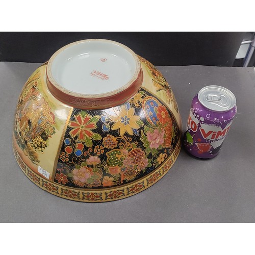 450 - Large ceramic chinese bowl depicting traditional scenes. H 14cm x W 30cm