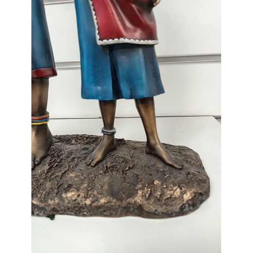 465 - The Leonardo collection Massai woman warrior and child figure H 46cm x W 26cm slight chip on rim of ... 