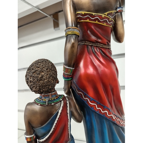 465 - The Leonardo collection Massai woman warrior and child figure H 46cm x W 26cm slight chip on rim of ... 