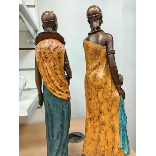 471 - Pair of African decorative lady figures one with child H 43cm x W 10cn and H 40cm x W 9cm