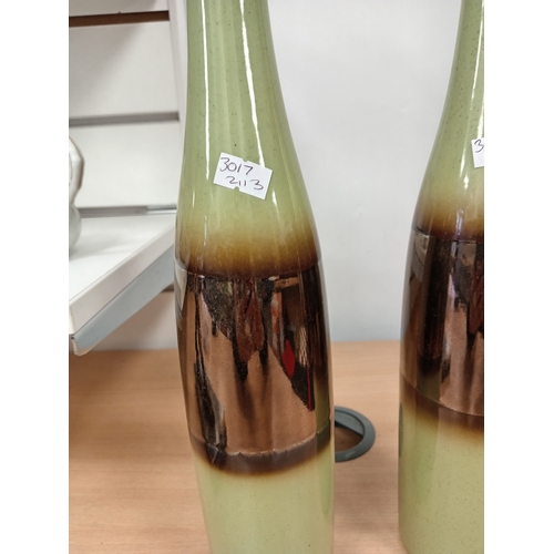 472 - Pair of green and copper effect glazed vases H 39cm x W 8cm