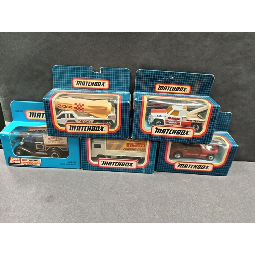 492 - Five boxed matchbox vehicles includes Ford Model A, Volvo tilt and GMC wrecker and rocket transporte... 