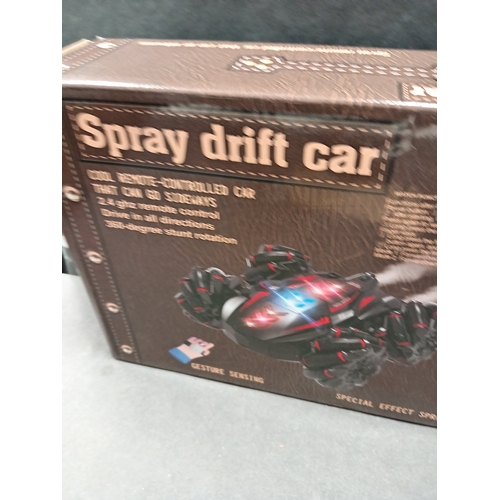 494 - Spray Drift car cool remote controlled with gesture sensing