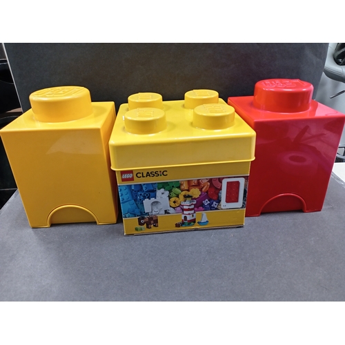 500 - Three lego storage boxes, Two small ones measure 15cm x W 12cm and one medium measures H 17cm x W 18... 