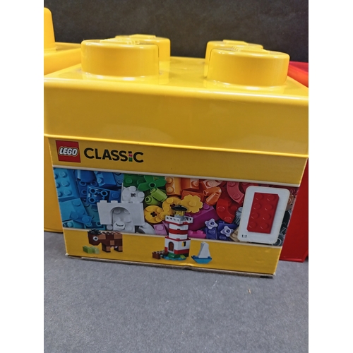 500 - Three lego storage boxes, Two small ones measure 15cm x W 12cm and one medium measures H 17cm x W 18... 