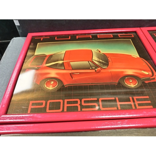 505 - Four vintage Red and black car prints framed includes two Porsche prints and two Ferrari pictures ea... 