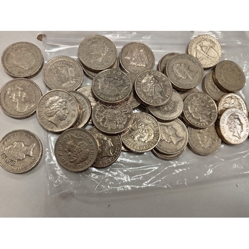 654 - Thirty-four old one pound coins £34 total