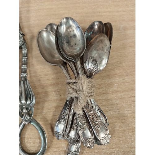 515 - Silver plated Victorian tea spoons and two pairs of silver plated grape scissors