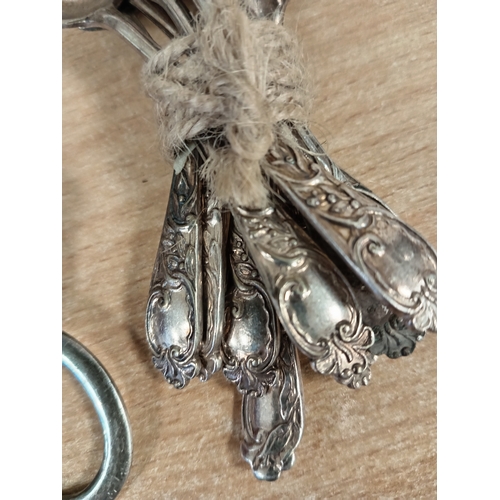 515 - Silver plated Victorian tea spoons and two pairs of silver plated grape scissors